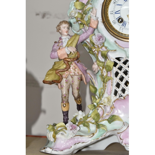 333 - TWO LATE 19TH CENTURY CONTINENTAL PORCELAIN CASED FIGURAL MANTEL CLOCKS, comprising a floral encrust... 