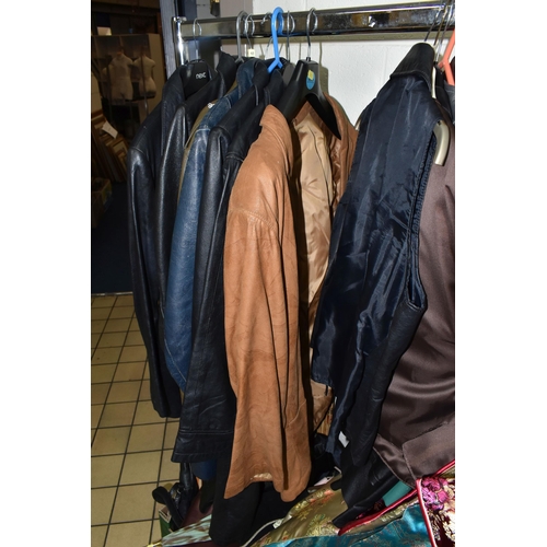 558 - THREE BOXES AND ONE RAIL OF WOMEN'S VINTAGE CLOTHING, clothing seven leather jackets in navy blue, b... 