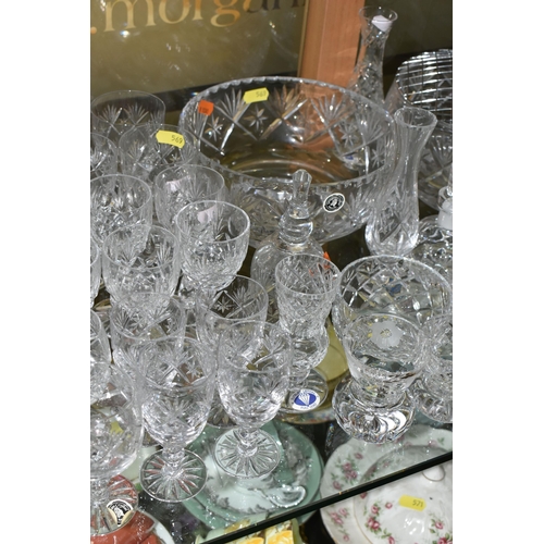 569 - A COLLECTION OF GLASSWARE, COLOURED AND CLEAR, including Murano style baluster vase, Tutbury Crystal... 