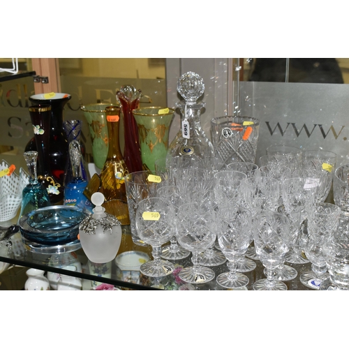 569 - A COLLECTION OF GLASSWARE, COLOURED AND CLEAR, including Murano style baluster vase, Tutbury Crystal... 