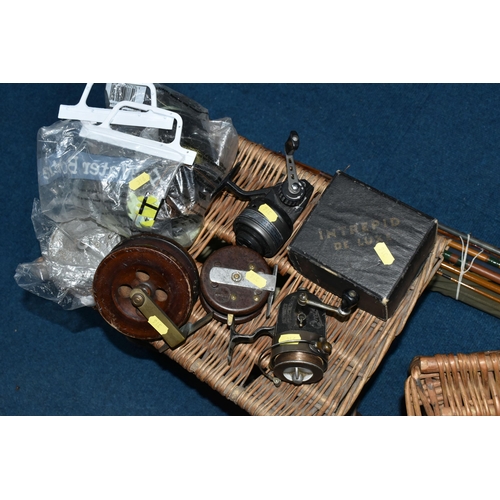 316 - TWO WICKER FISHING BASKETS AND A GROUP OF VINTAGE FISHING RODS AND REELS, comprising two hinged fish... 