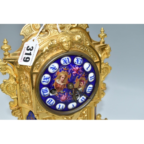 319 - A SECOND HALF 19TH CENTURY FRENCH GILT FIGURAL MANTEL CLOCK, the enamel dial with raised Roman numer... 