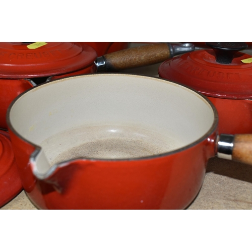 371 - A SET OF FIVE LE CREUSET RED SAUCEPANS, all with lids, comprising  sizes 14,16,18,20,22 (5) (Conditi... 