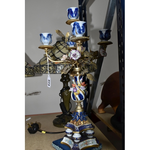 373 - A PAIR OF ITALIAN MANGANI PORCELAIN AND GILT METAL CANDELABRA, five flame, blue and white gilt desig... 