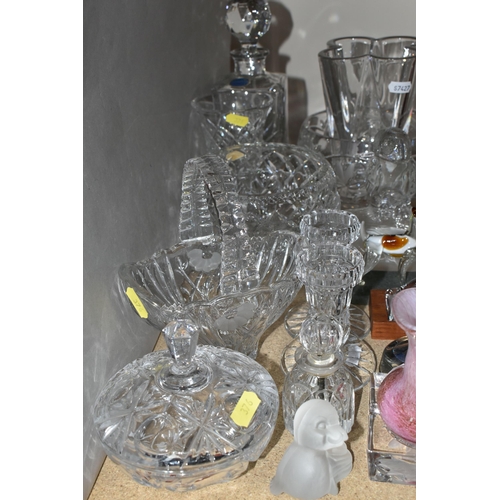 376 - A GROUP OF CUT CRYSTAL AND COLOURED GLASSWARE, comprising a clear glass Baccarat dolphin supported b... 