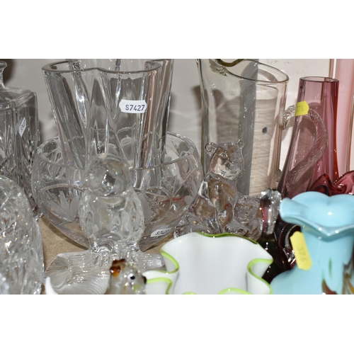 376 - A GROUP OF CUT CRYSTAL AND COLOURED GLASSWARE, comprising a clear glass Baccarat dolphin supported b... 