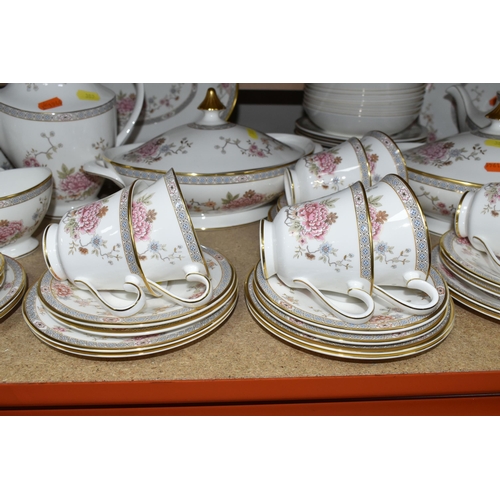 389 - ROYAL DOULTON 'CANTON' PATTERN DINNERWARE, comprising a celebration cake plate, ten dinner plates (n... 