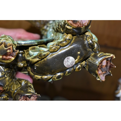 440 - A LARGE YARE DESIGNS ENGLAND POTTERY DRAGON, with paper label to base, height 26cm x length 30cm (1)... 