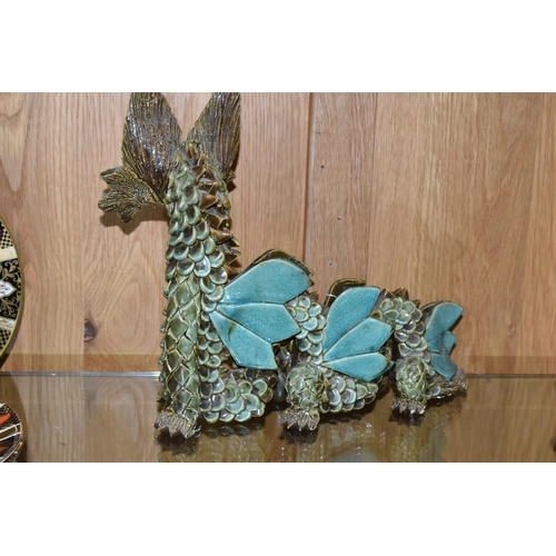 440 - A LARGE YARE DESIGNS ENGLAND POTTERY DRAGON, with paper label to base, height 26cm x length 30cm (1)... 