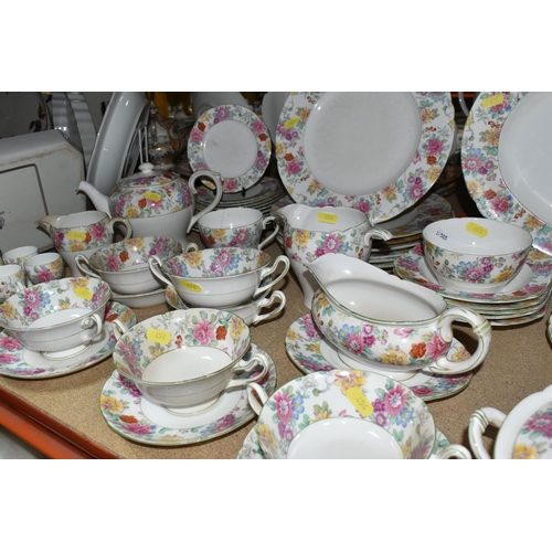 454 - A SHELLY 2321 FLORAL PATTERN DINNER SET, comprising two covered tureens, gravy jug and stand, large ... 