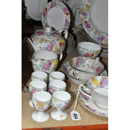 454 - A SHELLY 2321 FLORAL PATTERN DINNER SET, comprising two covered tureens, gravy jug and stand, large ... 