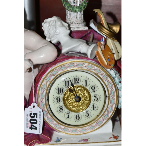 504 - A LATE 19TH CENTURY MEISSEN PORCELAIN CLOCK CASE, modelled with a seated putto reading, arm resting ... 