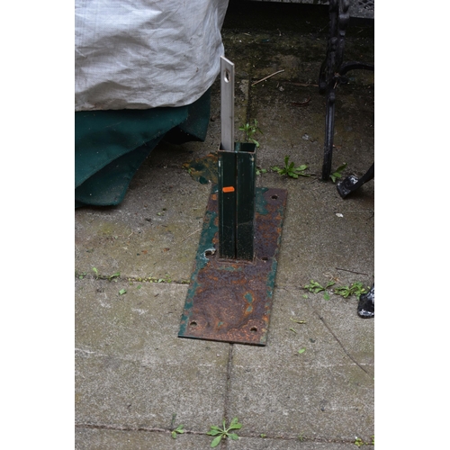 1025 - A VERY LARGE GREEN PARASOL, with base and protection bag, height approximately 280cm (condition - fu... 