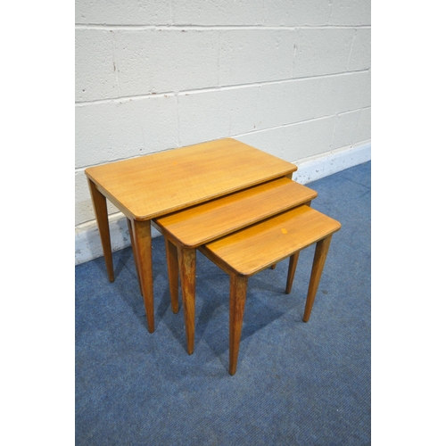 1199 - A MID CENTURY GORDON RUSSELL TEAK NEST OF THREE TABLES, largest table width 61cm depth 31cm x height... 