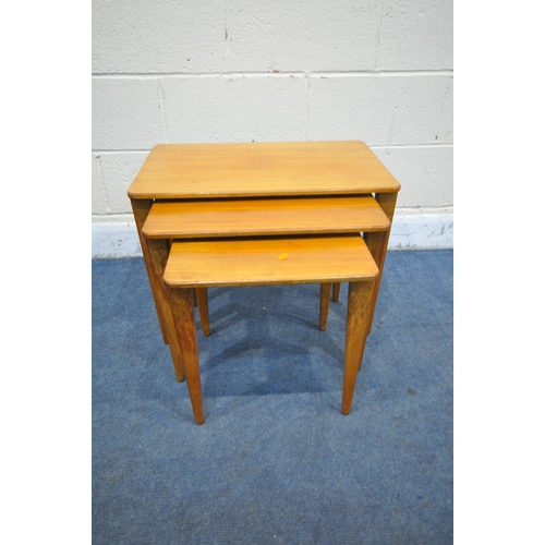 1199 - A MID CENTURY GORDON RUSSELL TEAK NEST OF THREE TABLES, largest table width 61cm depth 31cm x height... 