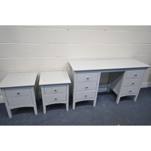 1293 - A MARKS AND SPENCERS GREY BEDROOM SUITE, comprising a dressing table with six drawers, width 137cm x... 