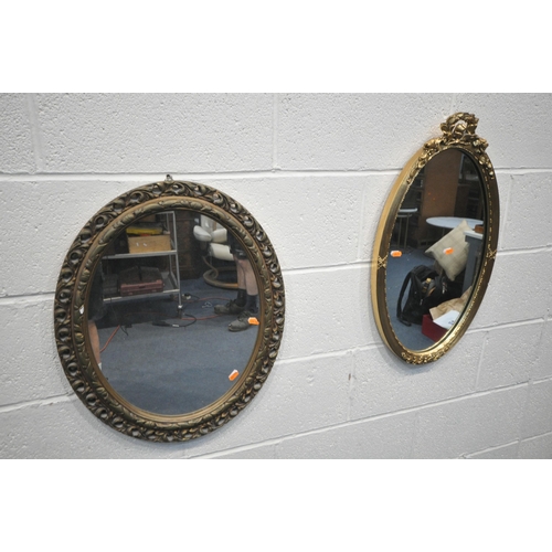 1301 - TWO GILT FRAMED OVAL WALL MIRRORS (condition report: small chip to one mirror)