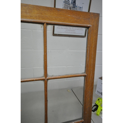 1302 - A LARGE 19TH CENTURY OAK BOOKCASE, the top breakfront section fitted with four astragal glazed doors... 