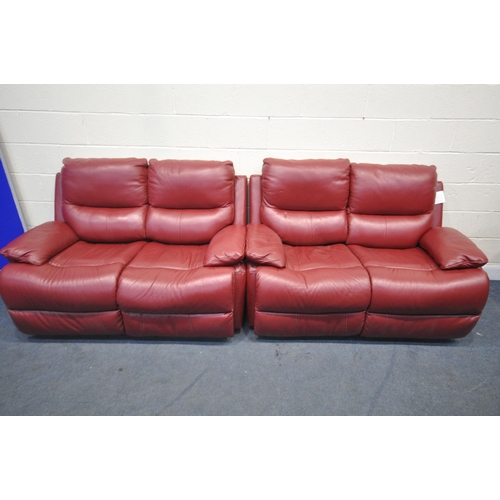 1310 - A RED LEATHER TWO PIECE RECLINING LOUNGE SUITE, comprising of two two seater settee, one electric an... 