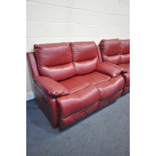 1310 - A RED LEATHER TWO PIECE RECLINING LOUNGE SUITE, comprising of two two seater settee, one electric an... 