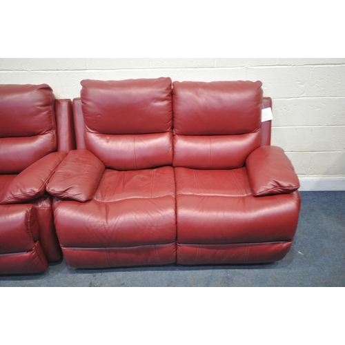 1310 - A RED LEATHER TWO PIECE RECLINING LOUNGE SUITE, comprising of two two seater settee, one electric an... 