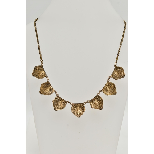 1 - A LATE 19TH CENTURY SCARAB NECKLACE, a gilt necklace comprised of seven floral panels, each prong se... 