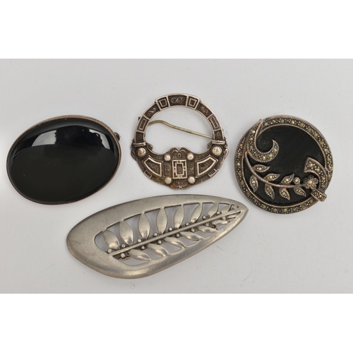 109 - FOUR SILVER AND WHITE METAL BROOCHES, the first an oval onyx brooch with silver fittings, hallmarked... 