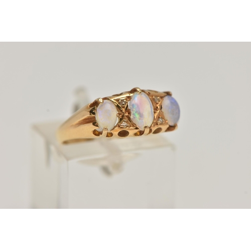 11 - AN EARLY 20TH CENTURY 18CT GOLD OPAL RING, three oval opals prong set with four rose cut diamond acc... 