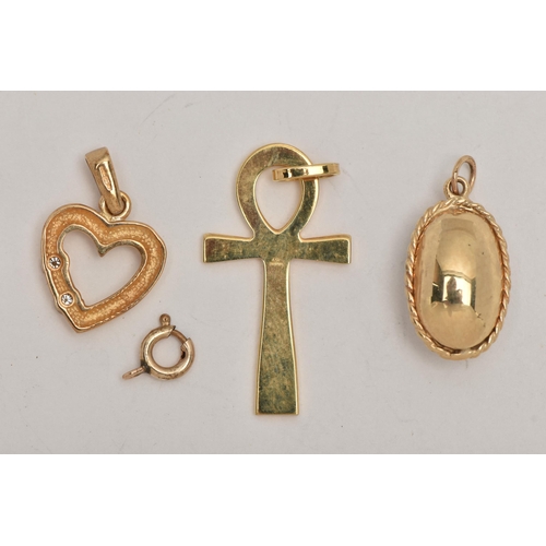 26 - THREE 9CT GOLD PENDANTS, the first a yellow gold open work heart pendant, bezel set with two round b... 