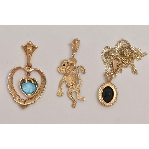 37 - THREE 9CT GOLD GEM SET PENDANTS, the first designed as a monkey, an open work heart pendant, and an ... 