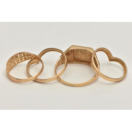 39 - FOUR 9CT GOLD RINGS, to include a yellow gold square signet, ring size T, two wishbone style rings, ... 