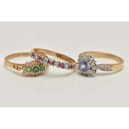 50 - THREE 9CT GOLD GEM SET RINGS, the first an emerald and diamond cluster ring, hallmarked 9ct Birmingh... 