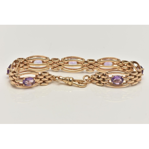 57 - A 9CT GOLD AMETHYST BRACELET, seven oval cut amethyst prong set in yellow gold, interspaced between ... 