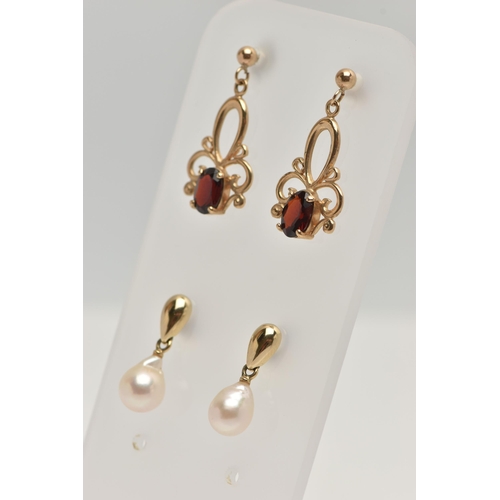 79 - TWO PAIRS OF GEM EARRINGS, the first designed as a cultured pearl drop suspended from a pear shape s... 