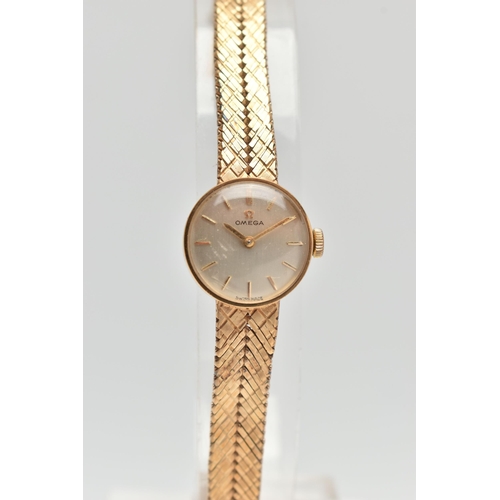 91 - A LADYS 9CT GOLD OMEGA WRISTWATCH, hand wound movement, round dial signed 'Omega', baton markers, ye... 