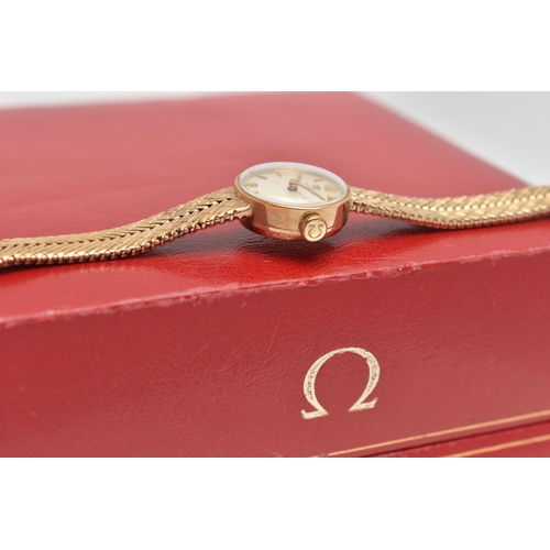 91 - A LADYS 9CT GOLD OMEGA WRISTWATCH, hand wound movement, round dial signed 'Omega', baton markers, ye... 