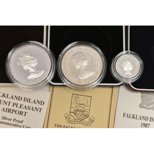 118 - THREE CASED SILVER FALKLAND ISLAND COINS, together with written information leaflets