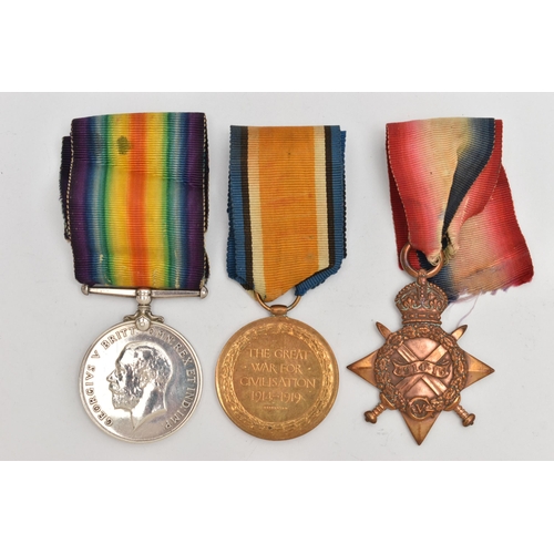 124 - A WWI DEATH PLAQUE AND MEDALS, issued to William John Logan, together with three medals all issued t... 