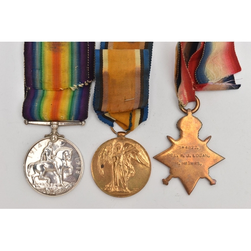 124 - A WWI DEATH PLAQUE AND MEDALS, issued to William John Logan, together with three medals all issued t... 