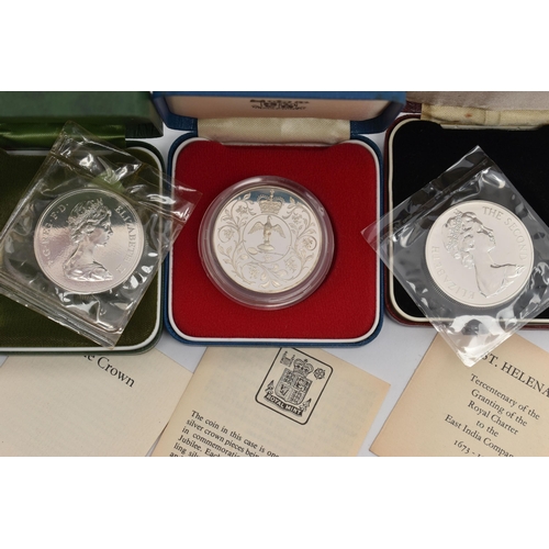 133 - THREE CASED COINS, to include a Proof commemorative coin of the Queens Silver Jubilee 1977 coin, a c... 