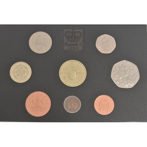 134 - TWO CASED SETS OF COINS, to include a 1994 United Kingdom Proof Coin Collection, and a 1993 United K... 