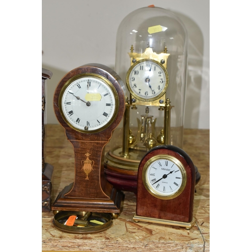 352 - A GROUP OF FIVE CLOCKS, comprising a German anniversary clock, marked 154124 with key (not on origin... 