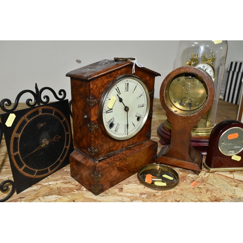 352 - A GROUP OF FIVE CLOCKS, comprising a German anniversary clock, marked 154124 with key (not on origin... 