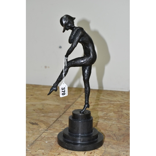 370 - AFTER DEMETRE CHIPARUS, A BRONZE 'HARLEQUIN' FIGURE, modelled glancing over her shoulder, standing o... 