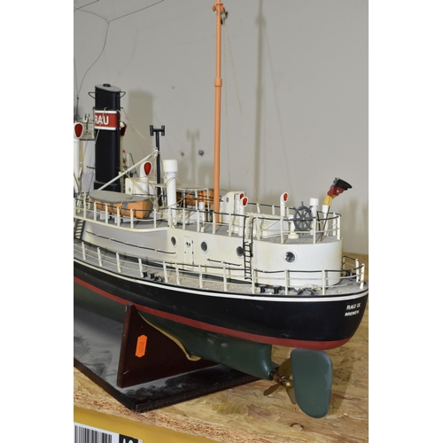 372 - A MOTORISED MODEL SHIP, RAU IX, rests on a stand, motor in internal compartment, length approximatel... 