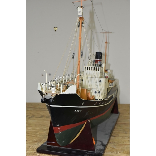 372 - A MOTORISED MODEL SHIP, RAU IX, rests on a stand, motor in internal compartment, length approximatel... 