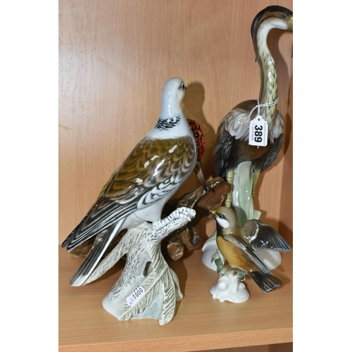 389 - FOUR ROSENTHAL PORCELAIN BIRDS, comprising a heron by Hugo Meisel, height 34.5cm, a green woodpecker... 