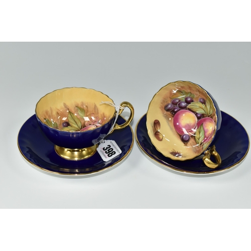 398 - TWO AYNSLEY ORCHARD GOLD TEACUPS AND SAUCERS, each teacup having gently fluted bowl, cobalt blue ext... 