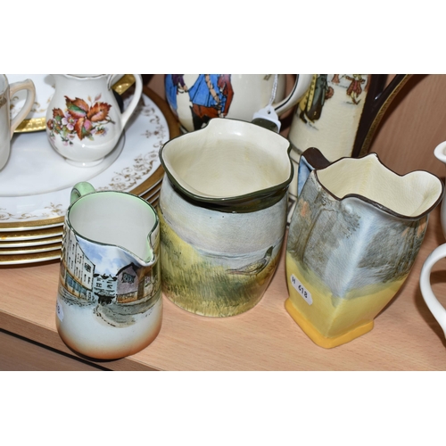 401 - A GROUP OF ROYAL DOULTON, comprising a Souvenir of the Great War cup, six, mostly series ware, jugs:... 