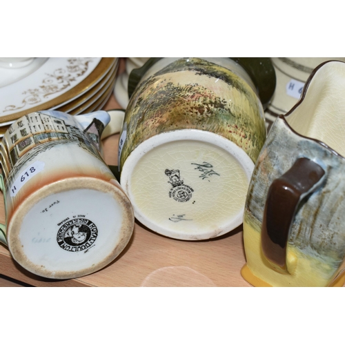 401 - A GROUP OF ROYAL DOULTON, comprising a Souvenir of the Great War cup, six, mostly series ware, jugs:... 